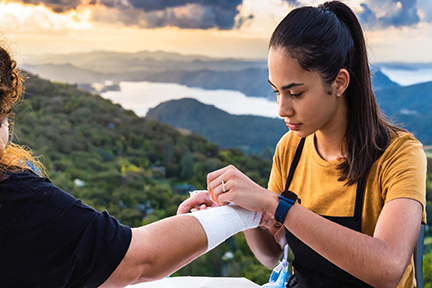 bandaging persons arm